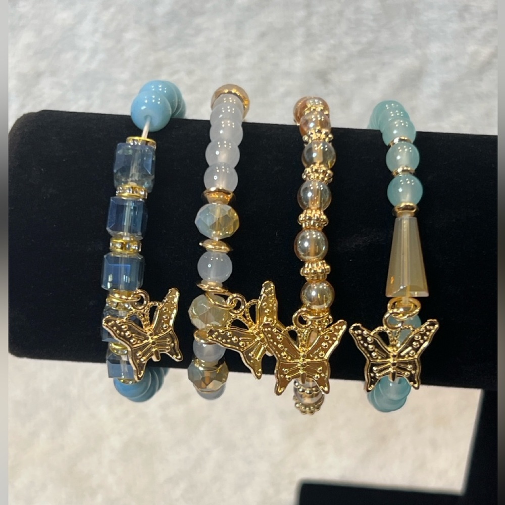 Elegant Gold Butterfly Charm Bracelet Set in shades of blue/champagne Combo
